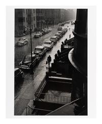 Ruth Orkin (1921-1985) Man in Rain, West 88th Street, New York City, 1952
