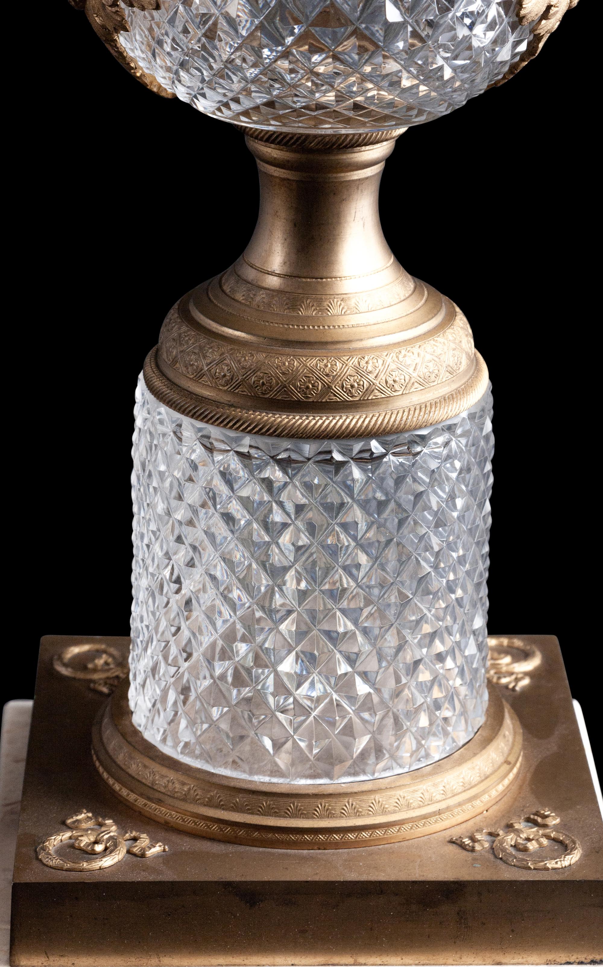 A Pair of Empire Style Gilt Metal Mounted Cut Glass Urns Mounted as Lamps