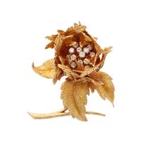 HAMMERMAN BROTHERS, YELLOW GOLD AND DIAMOND FLOWER BROOCH