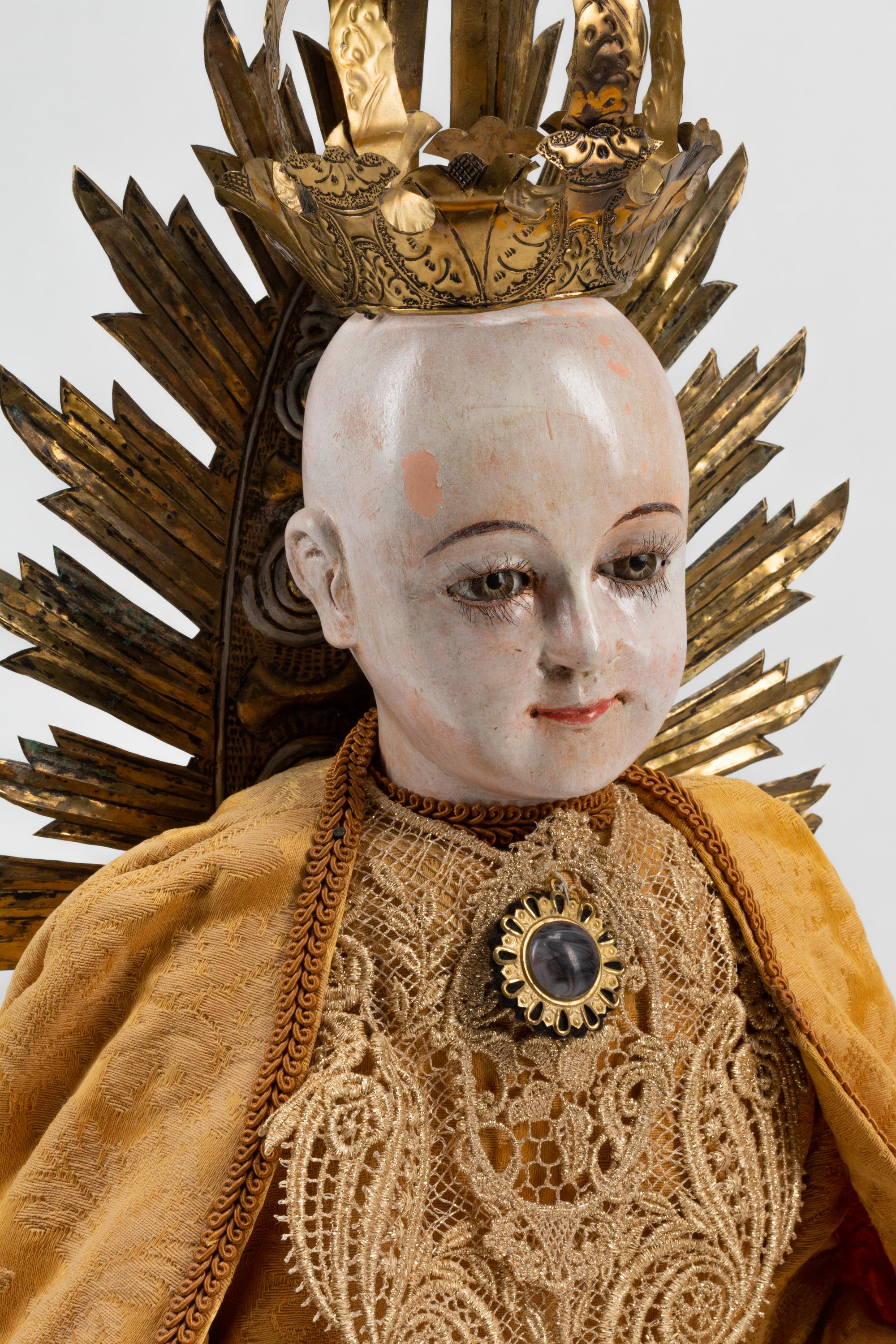 A Spanish Silver-Mounted Figure of a Saint