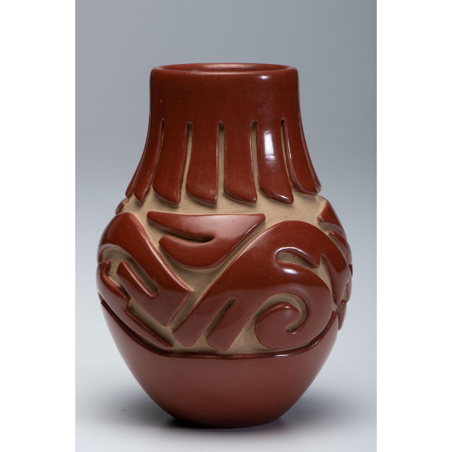 Carved Redware Jar, with Avanyu