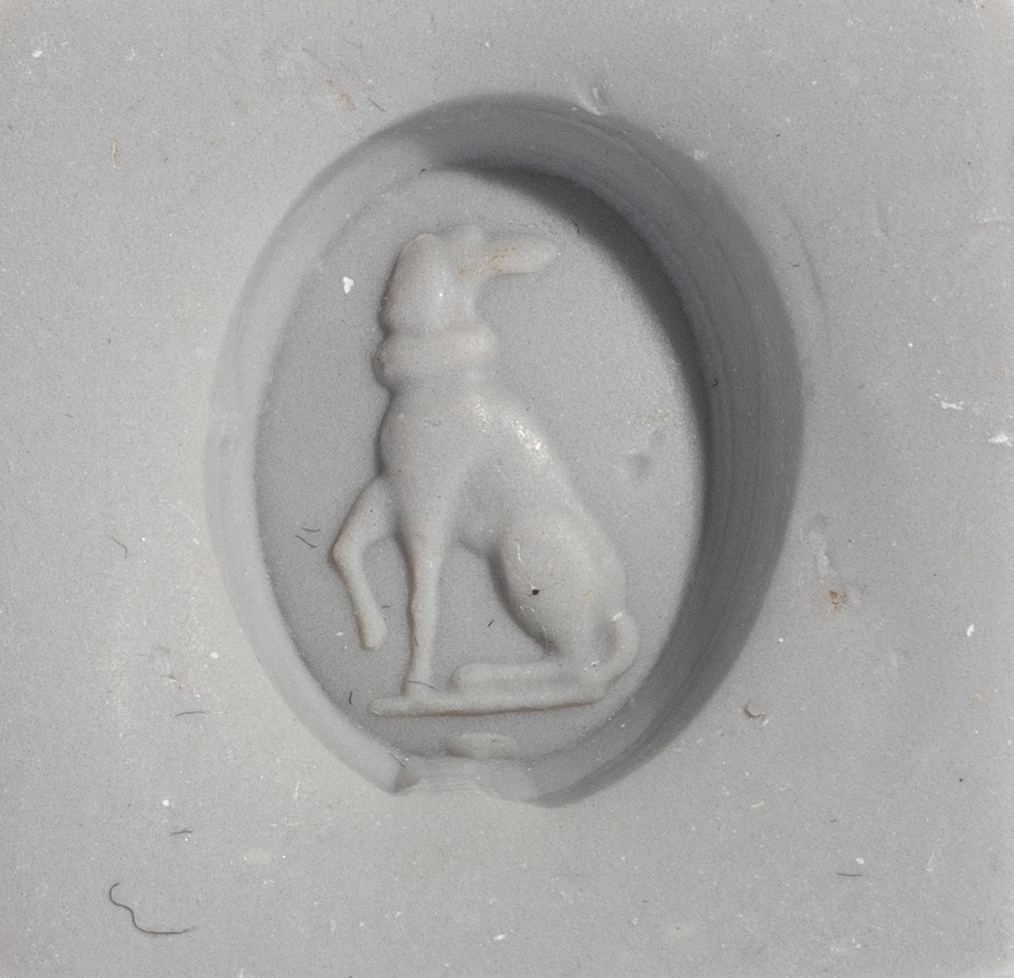 Two Roman Bloodstone and Carnelian Ringstones with Dogs