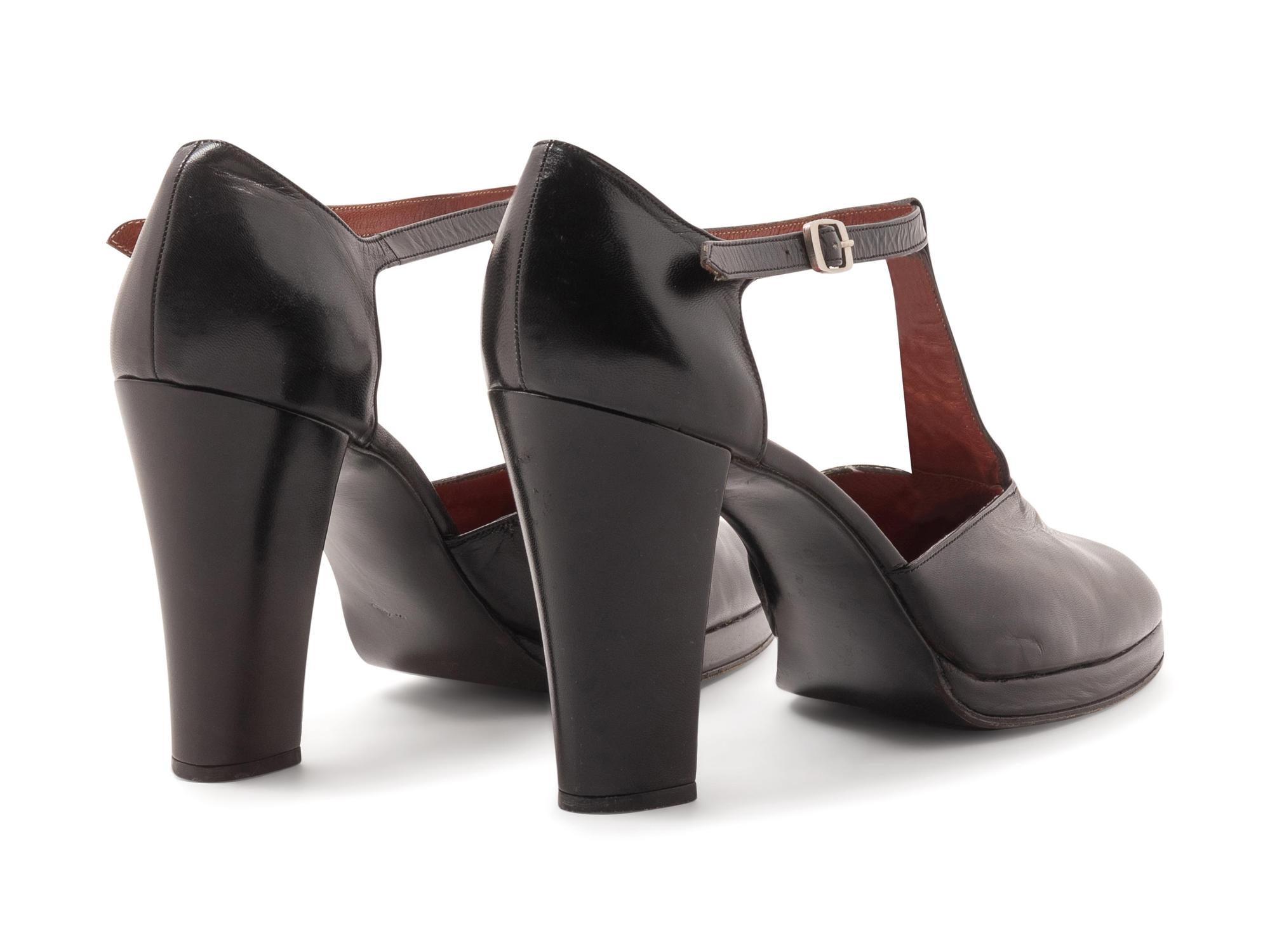 One Yves Saint Laurent and One Givenchy Pair of Shoes, 1970-80s