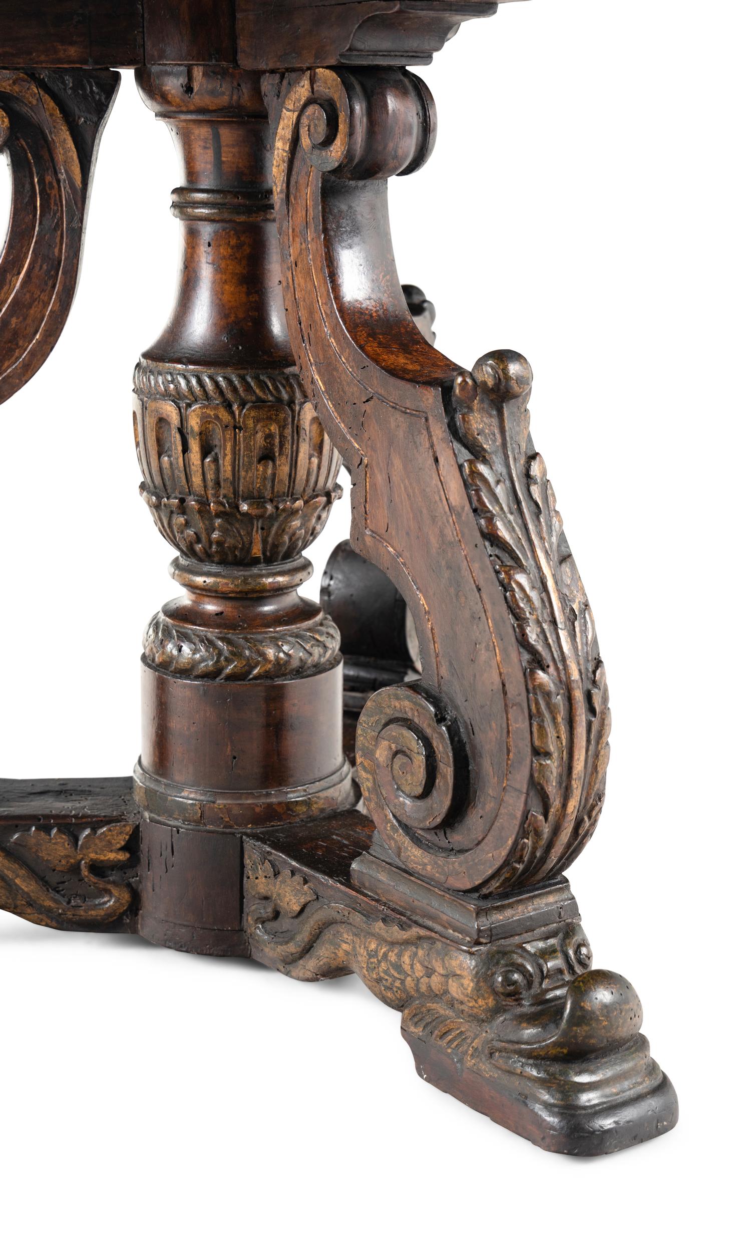 A Continental Parcel Gilt Beechwood and Olivewood Center Table