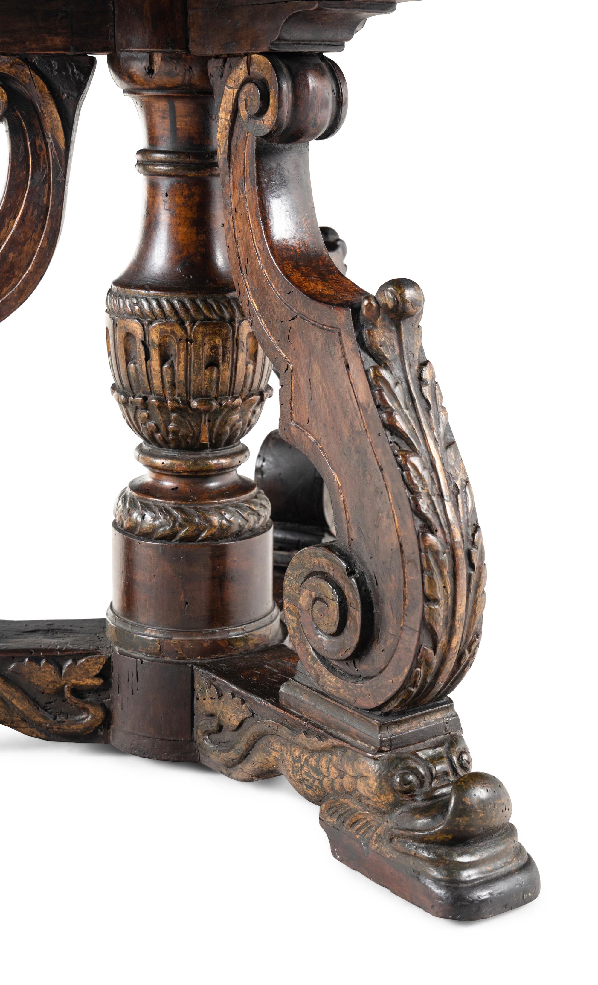 A Continental Parcel Gilt Beechwood and Olivewood Center Table