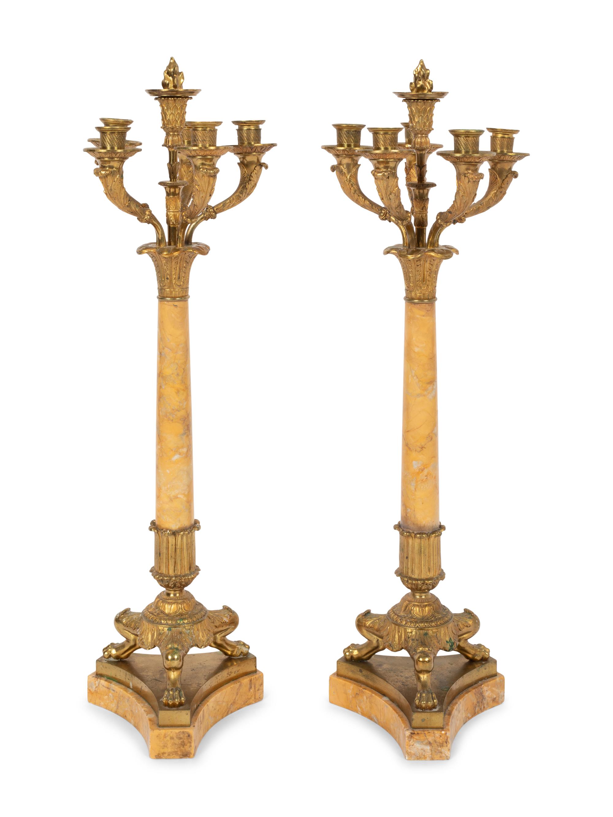A Pair of Charles X Gilt Bronze and Marble Five-Light Candelabra