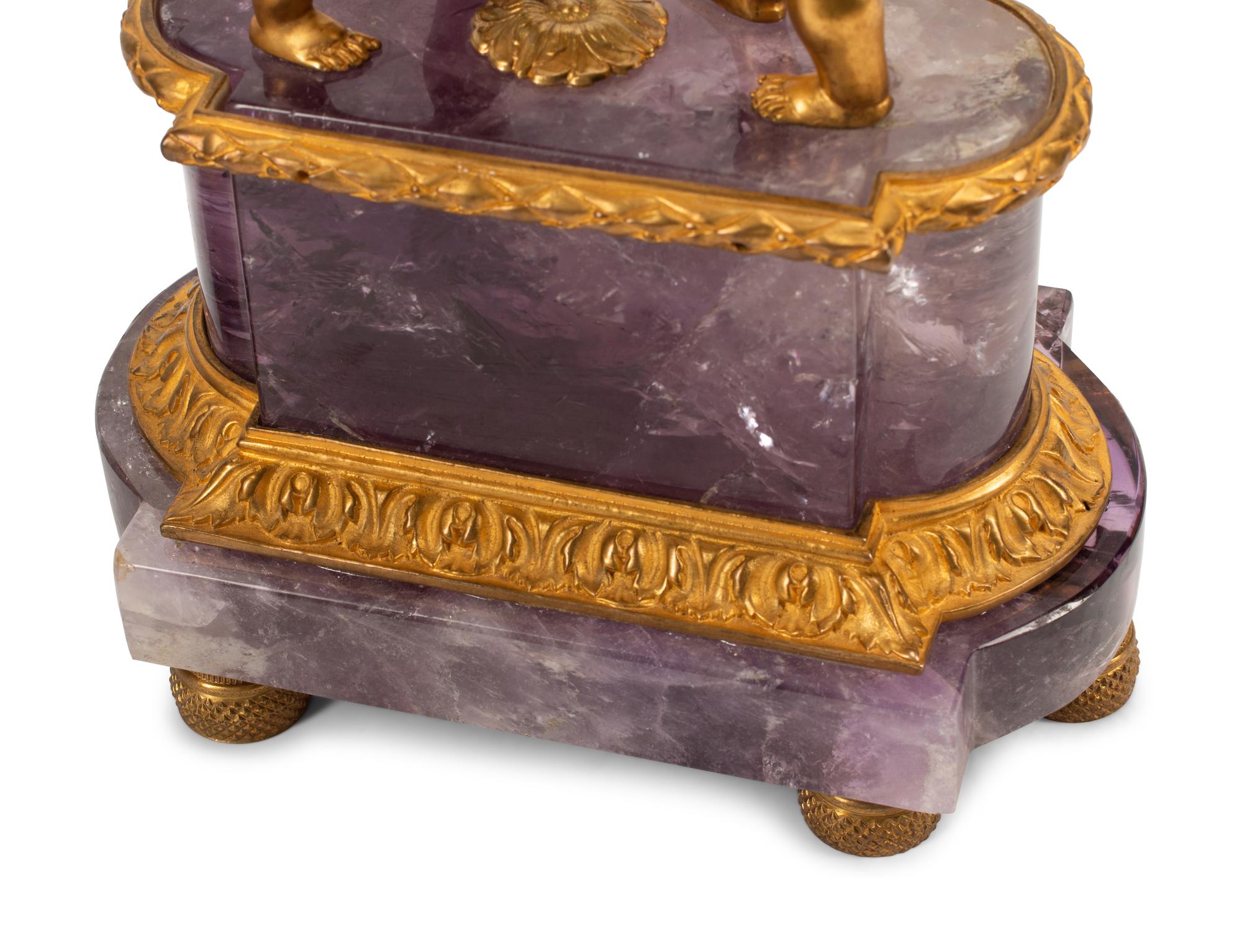 A Pair of French Gilt Bronze and Amethyst Figural Urns