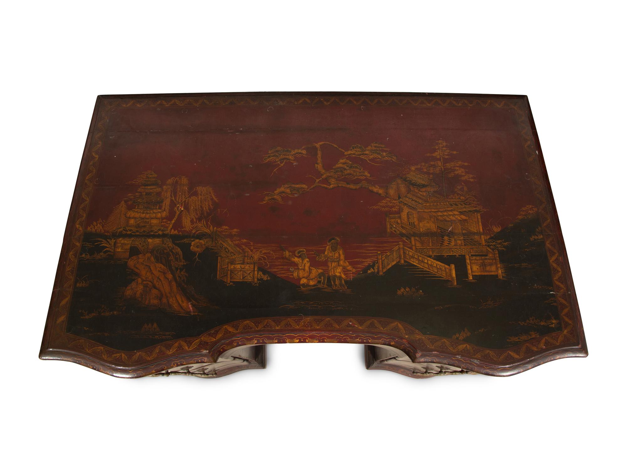 A George III Style Red and Gilt Japanned Knee-Hole Desk