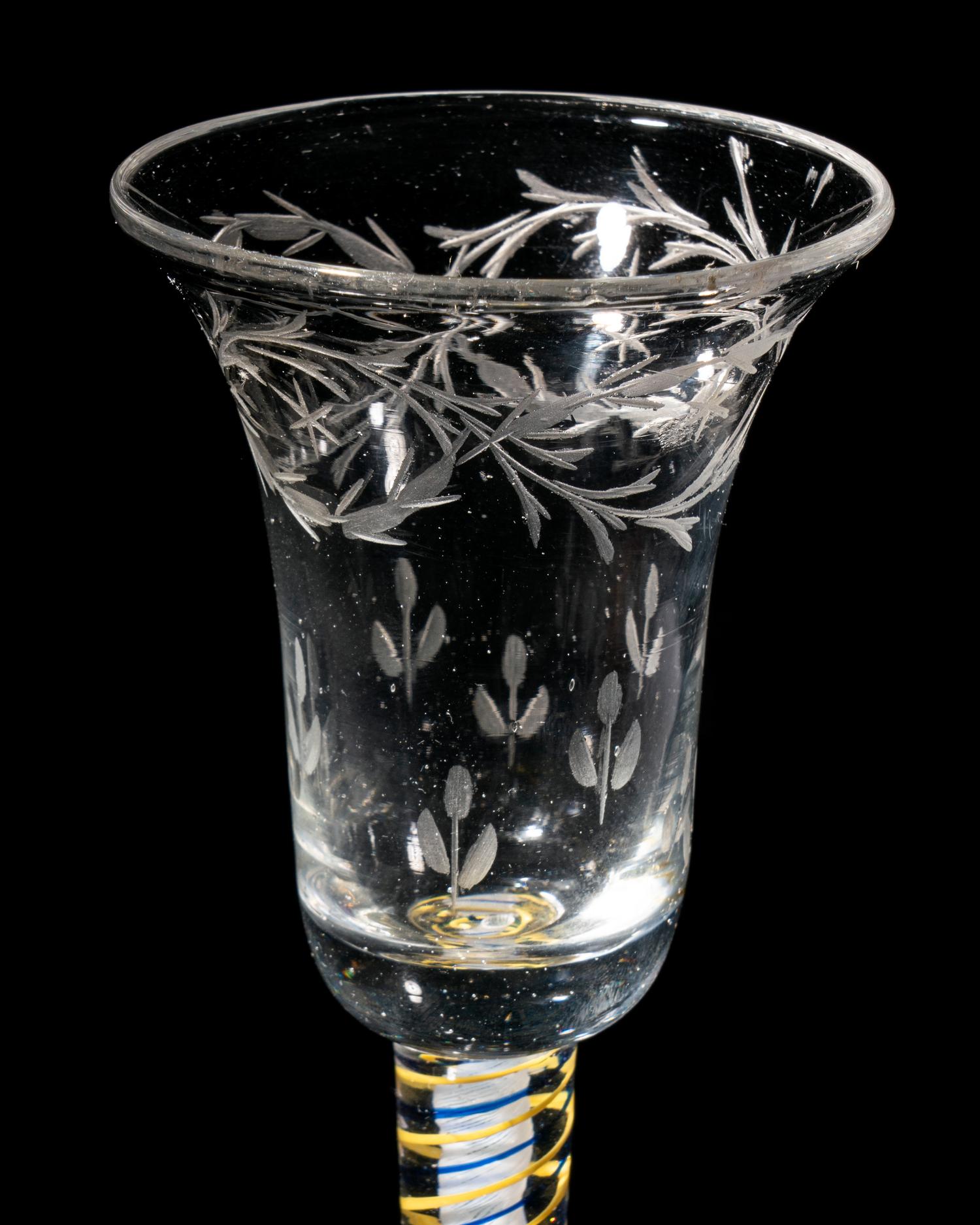 A Rare Canary-Yellow and Blue Color Twist Engraved Wine Glass