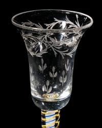 A Rare Canary-Yellow and Blue Color Twist Engraved Wine Glass