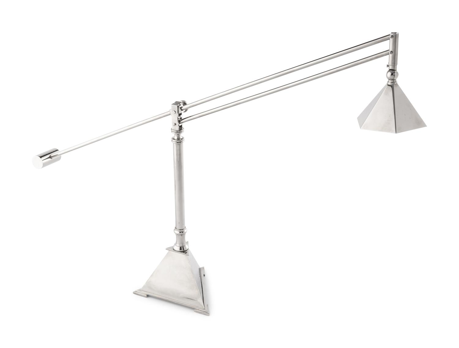 A Contemporary Chromed Metal Counter-Balance Desk Lamp
