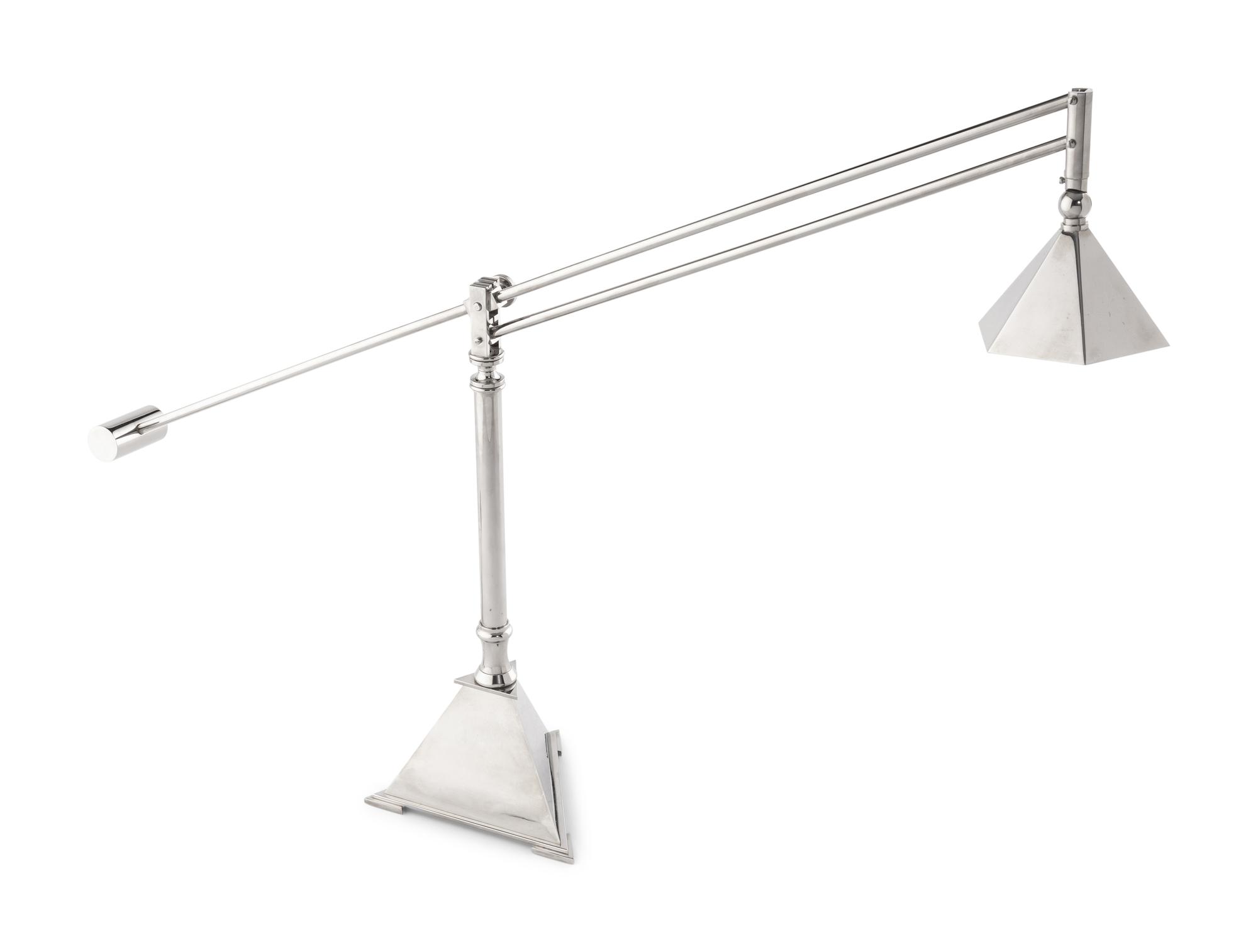 A Contemporary Chromed Metal Counter-Balance Desk Lamp