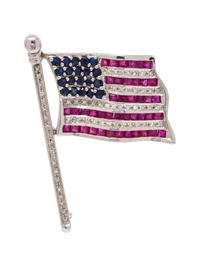 A 14 Karat White Gold, Diamond, Ruby and Sapphire Flag Brooch,
