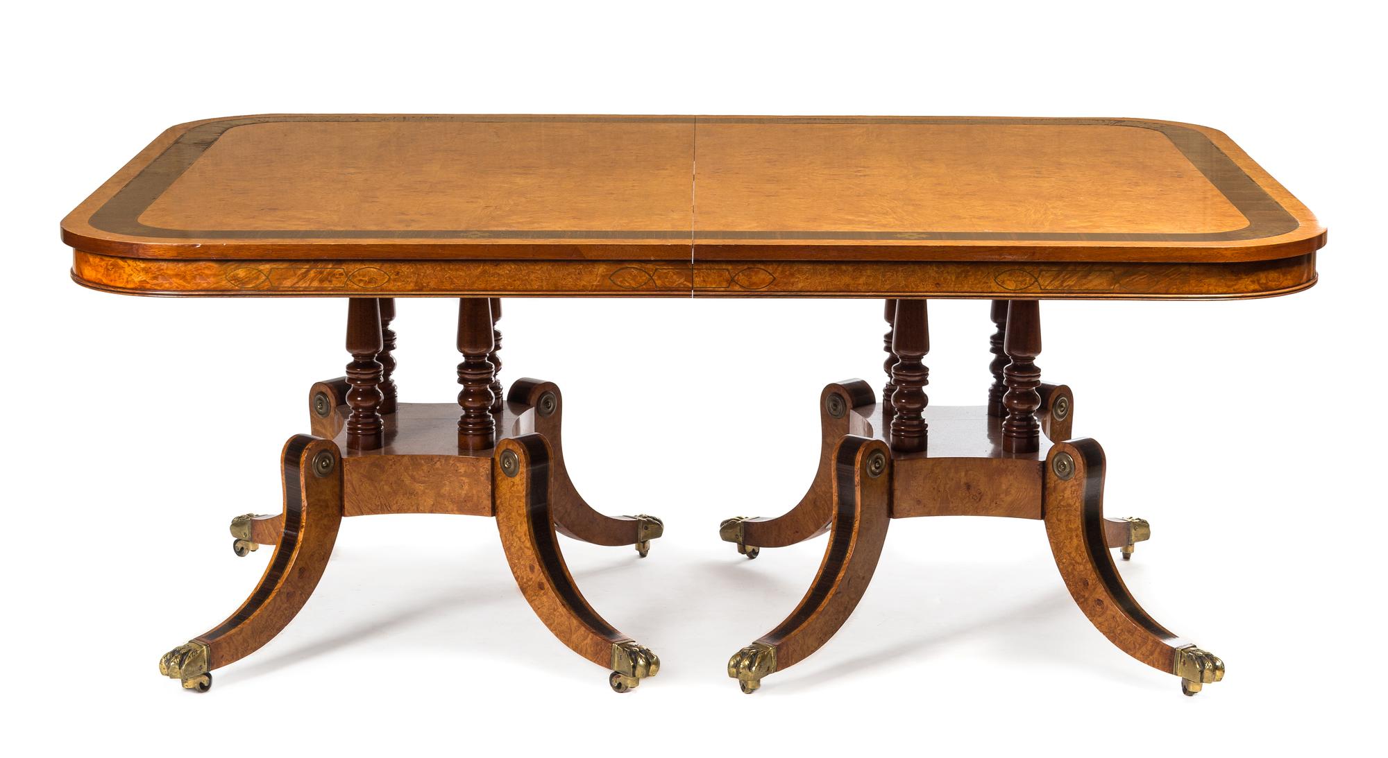 A Regency Style Brass Inlaid Burlwood Dining Table Height 29 1/2 x depth 52 x length 119 inches (fully extended). — ARTHUR BRETT & SONS, 20TH CENTURY