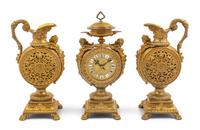 A French Neoclassical Gilt Metal Clock Garniture Height of mantel clock 16 x width 7 x depth 4 1/2 inches. — LATE 19TH CENTURY