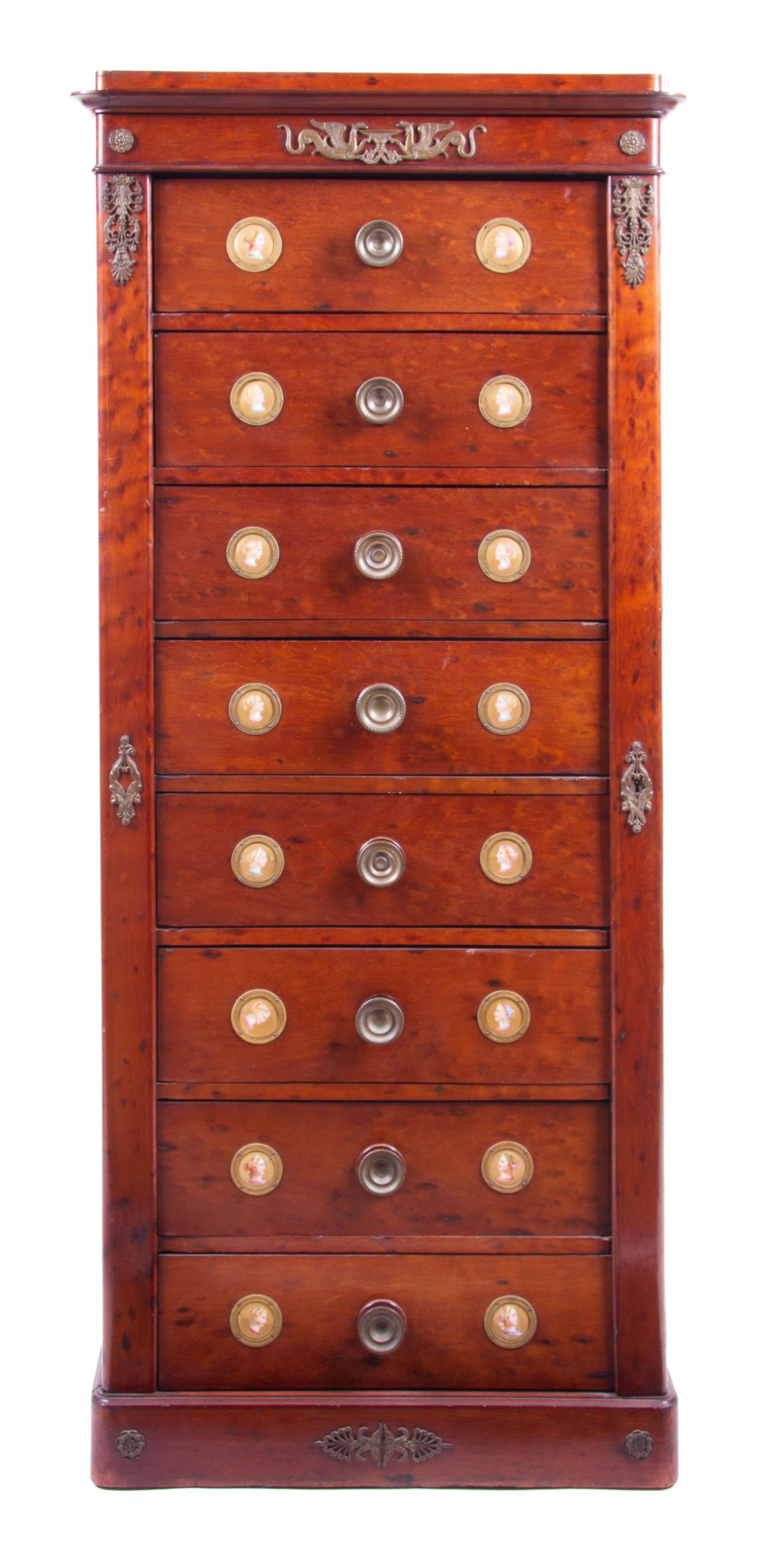 A Regency Mahogany Wellington Chest Height 59 x width 25 3/4 x depth 15 1/2 inches. — 19TH CENTURY