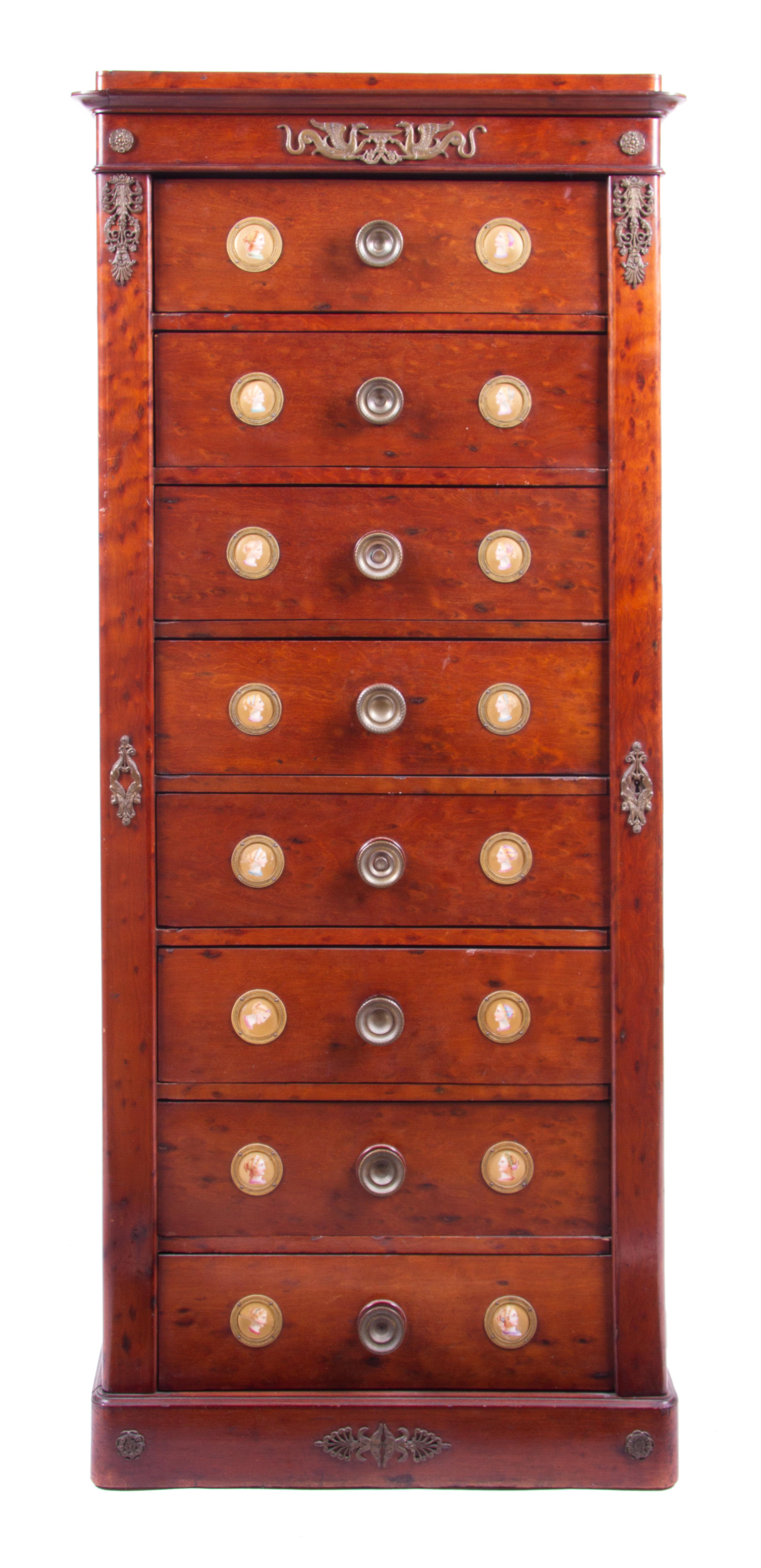 A Regency Mahogany Wellington Chest Height 59 x width 25 3/4 x depth 15 1/2 inches. — 19TH CENTURY