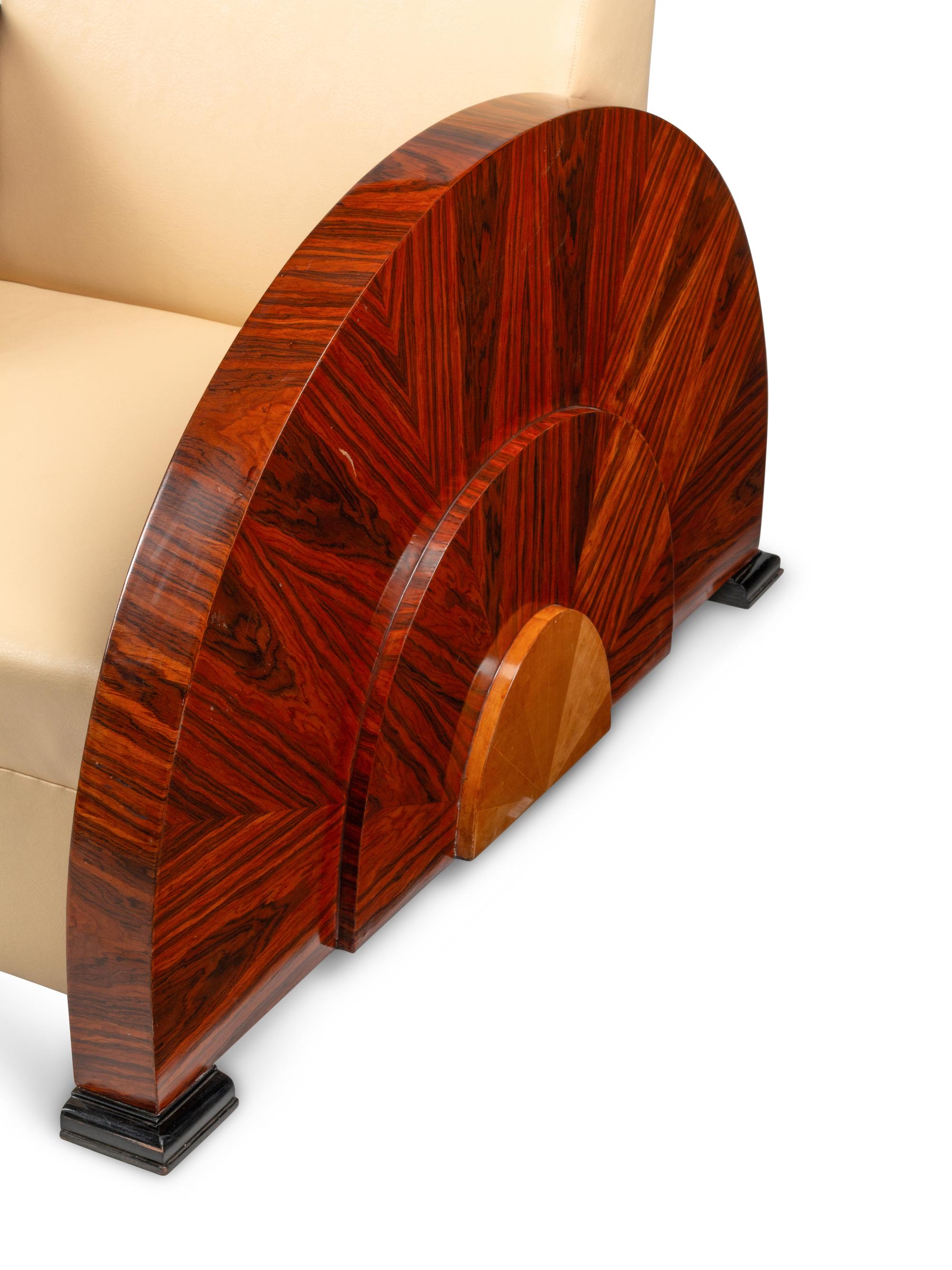 A Pair of Art Deco Style Rosewood Lounge Chairs