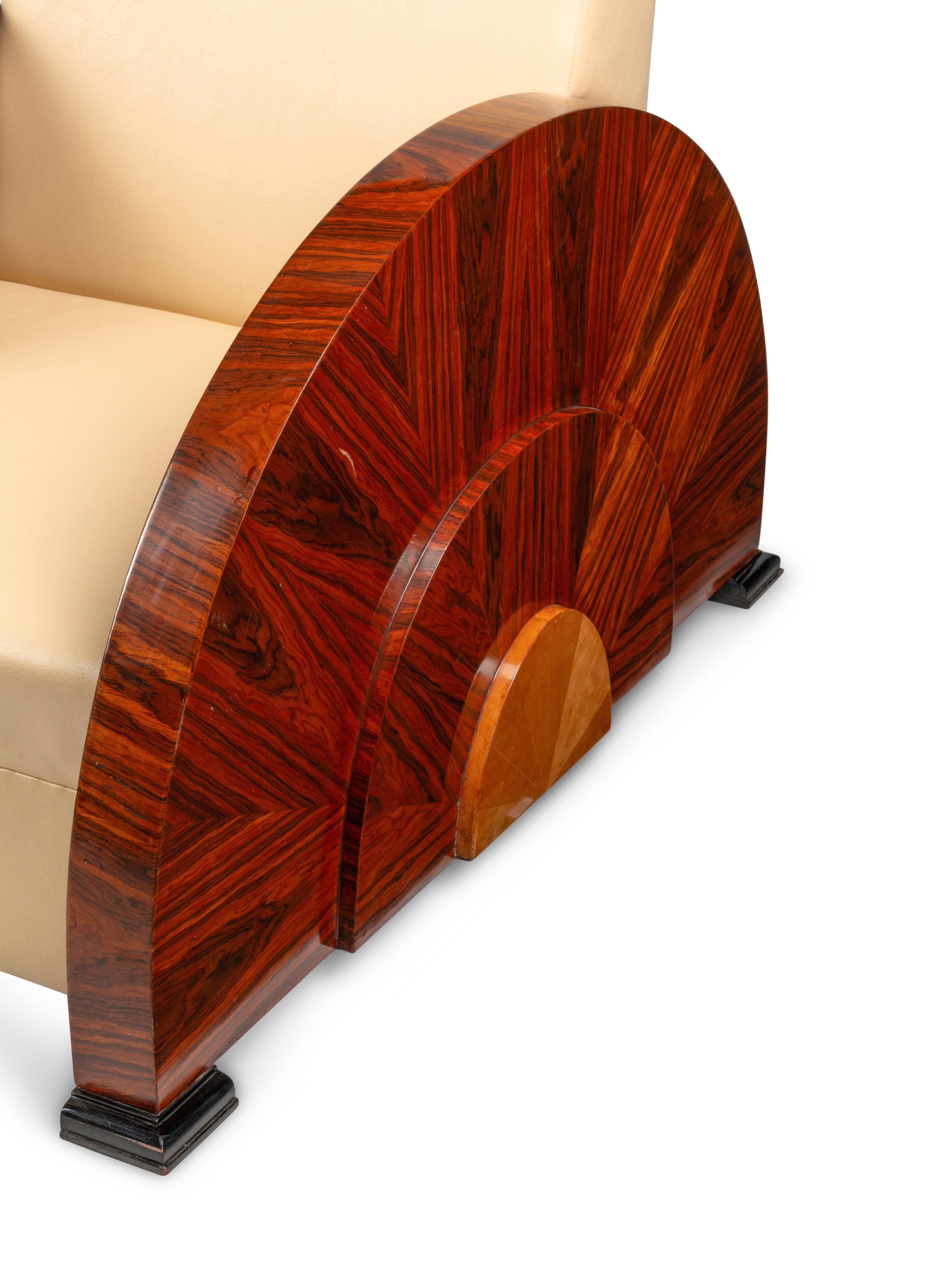 A Pair of Art Deco Style Rosewood Lounge Chairs