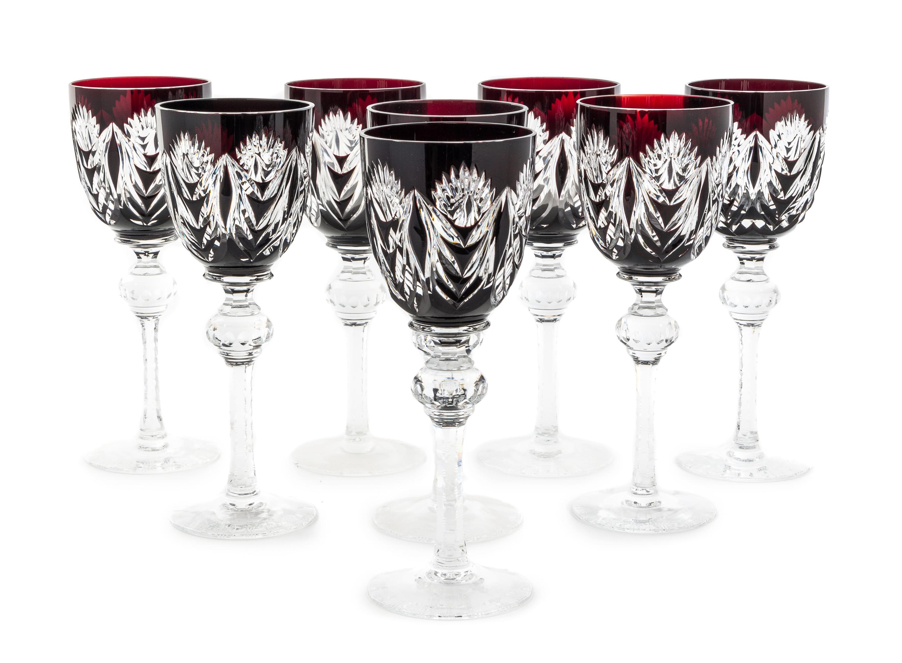 A Set of Eight Red Cut to Clear Glass Wine Stems Height 8 1/4 inches.