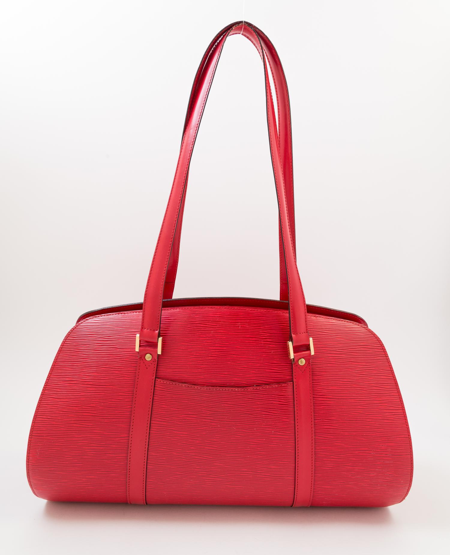 A Louis Vuitton Red Saffiano Shoulder Bag, 17.5" x 11" 7.5"; Strap drop: 12".