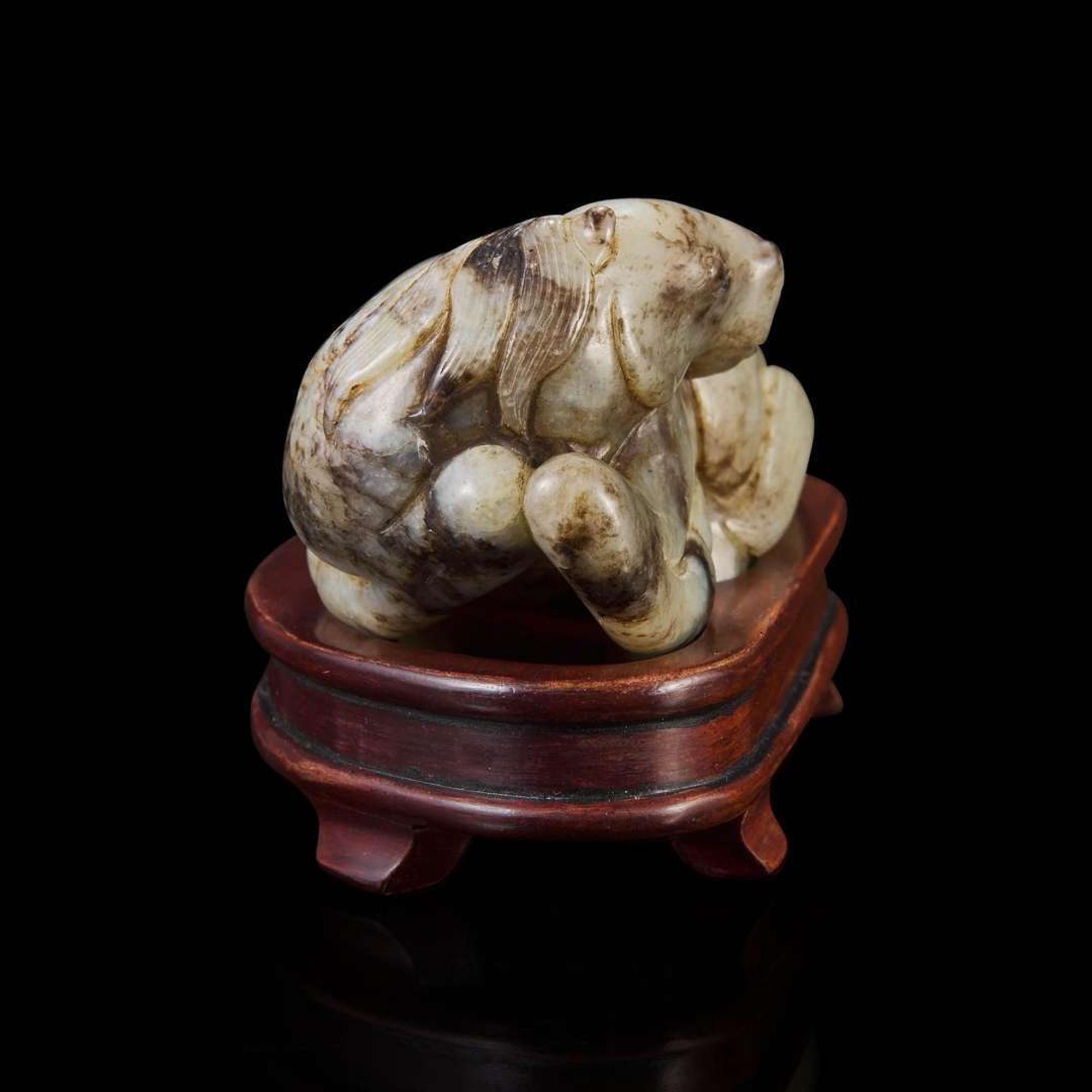A Chinese jade carving of a recumbent horse 玉雕卧马 Ming dynasty-early Qing dynasty ????