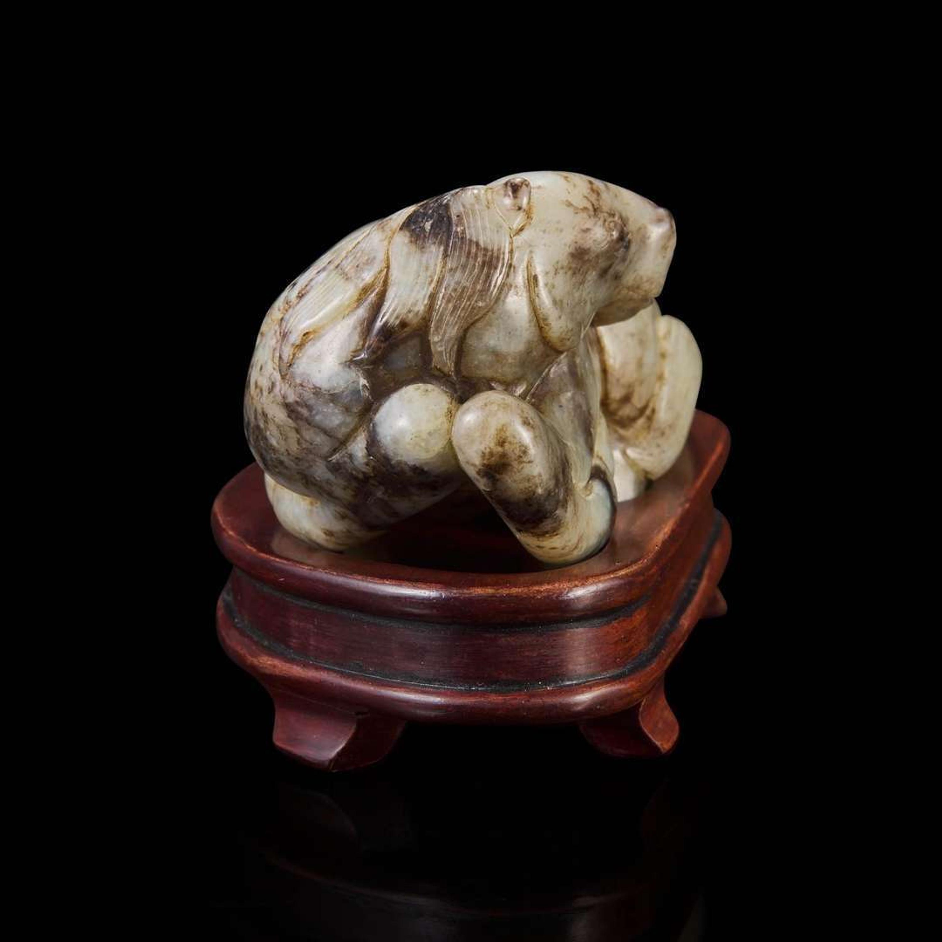 A Chinese jade carving of a recumbent horse 玉雕卧马 Ming dynasty-early Qing dynasty ????