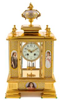 A French Porcelain Mounted Gilt Metal Clock