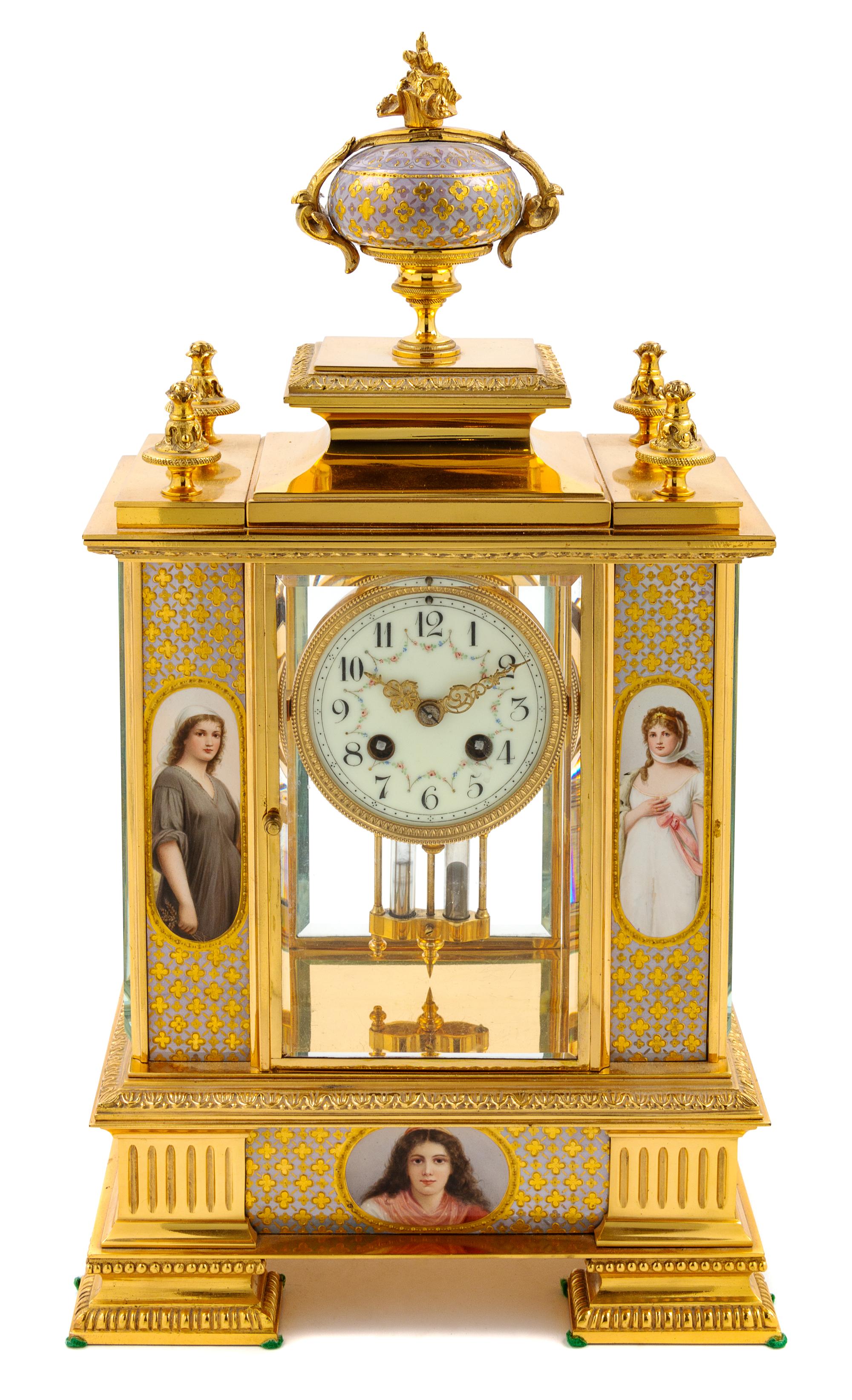 A French Porcelain Mounted Gilt Metal Clock
