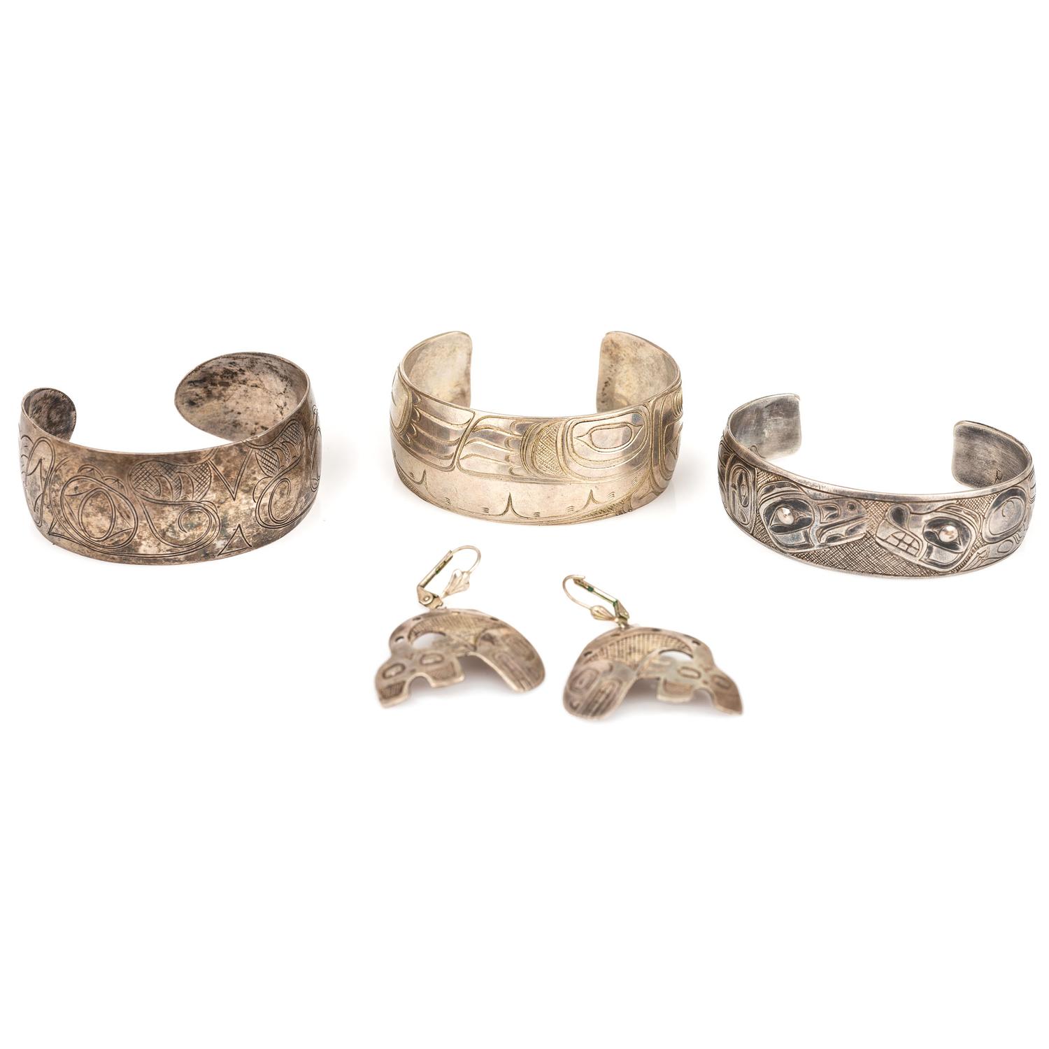 Northwest Coast Etched Figural Silver Cuff Bracelets and Earrings