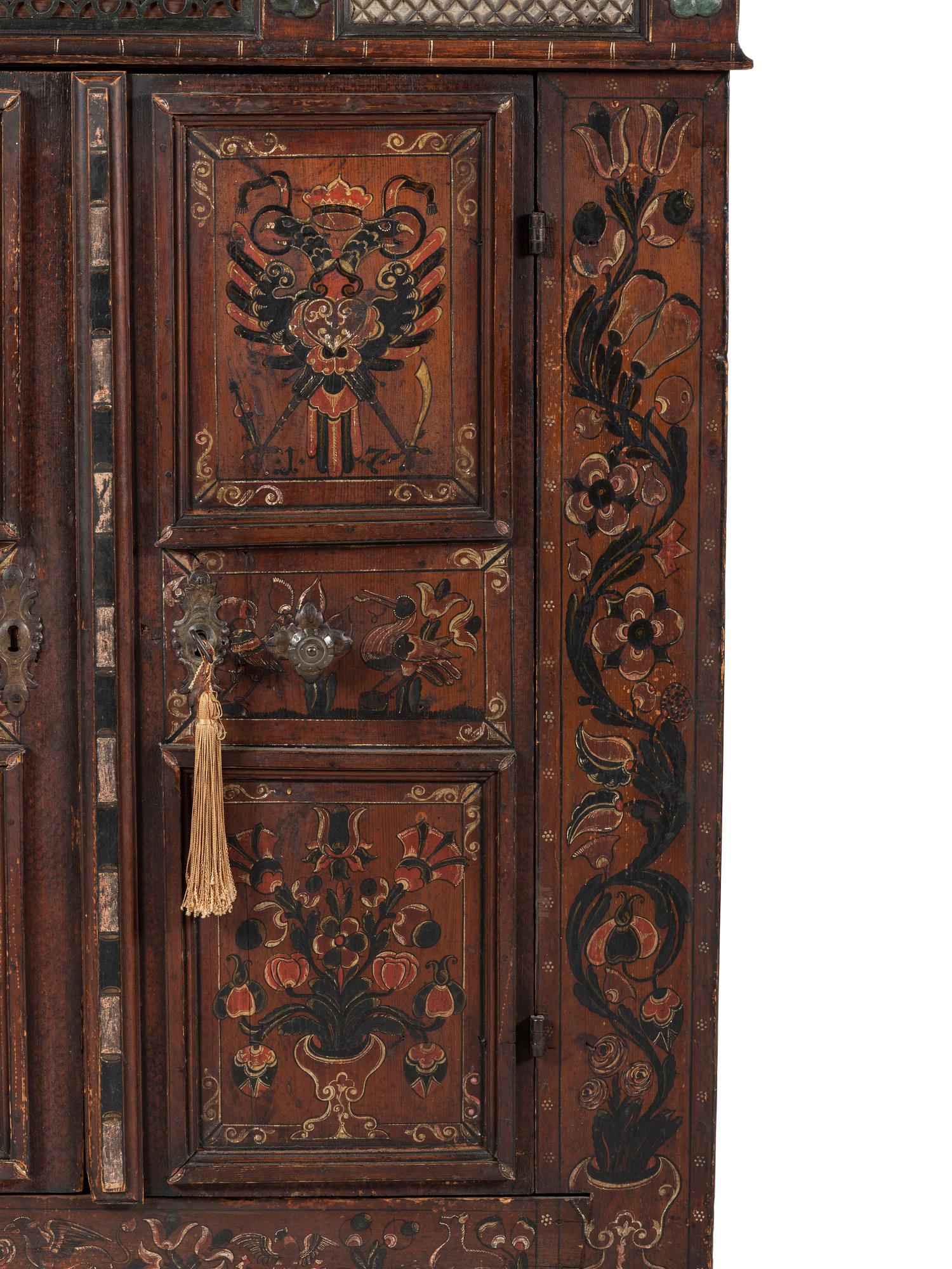 A Continental Carved and Paint Decorated Wardrobe
