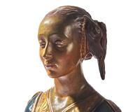 An Italian Renaissance-style bust of a young woman