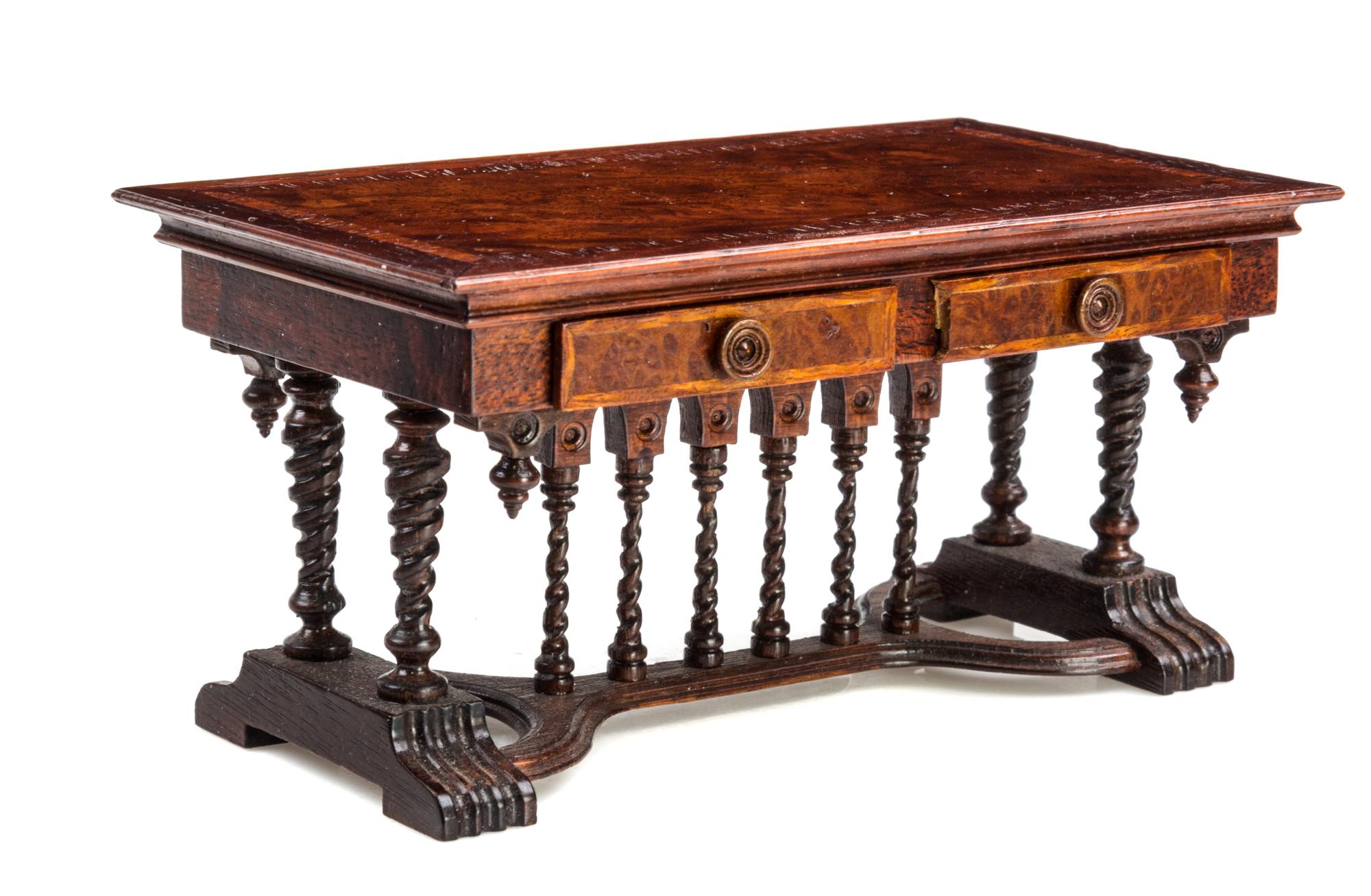 A Renaissance Revival Style Library Table Height 2 1/2 x width 5 x depth 2 7/8 inches. — Gilbert Mena, 1993