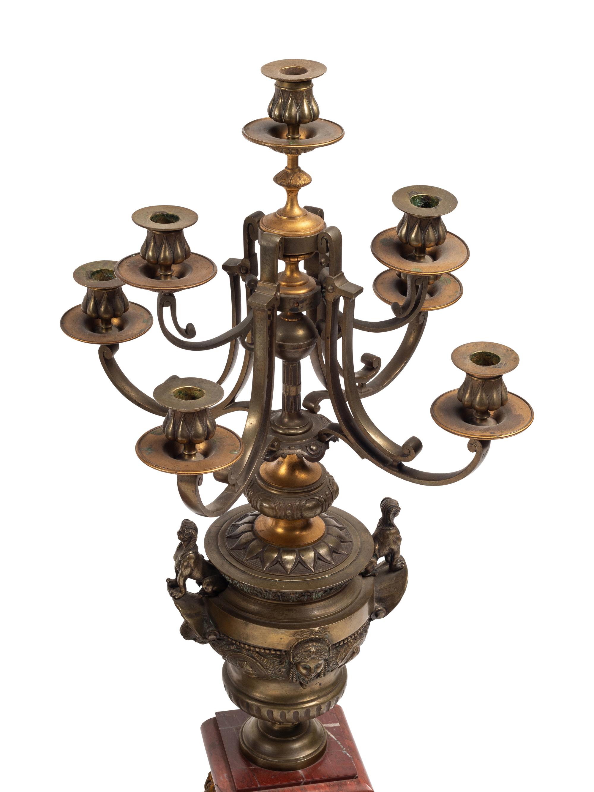 A Monumental French Neoclassical Gilt Bronze and Rouge Marble Clock Garniture