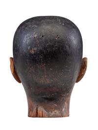 A Folk Art Carved and Painted Pine Carnival Head