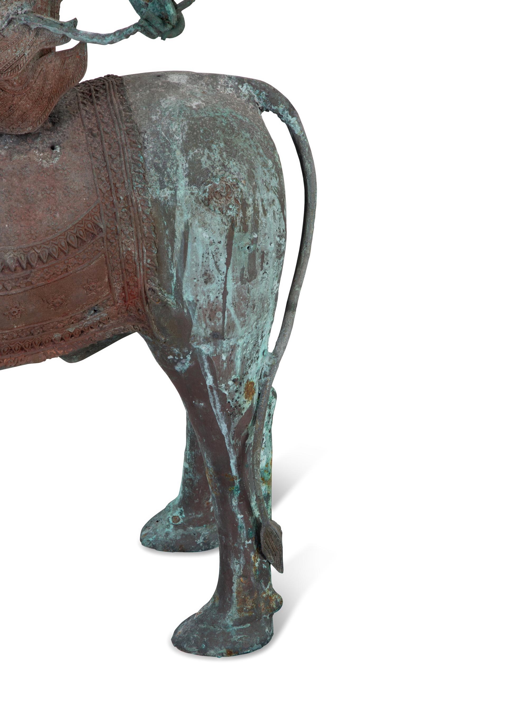 A Tibetan Bronze Durga on Bull — 20TH CENTURY