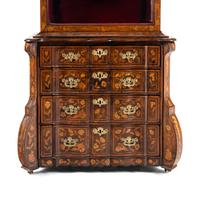 A Dutch Marquetry Bookcase on Chest