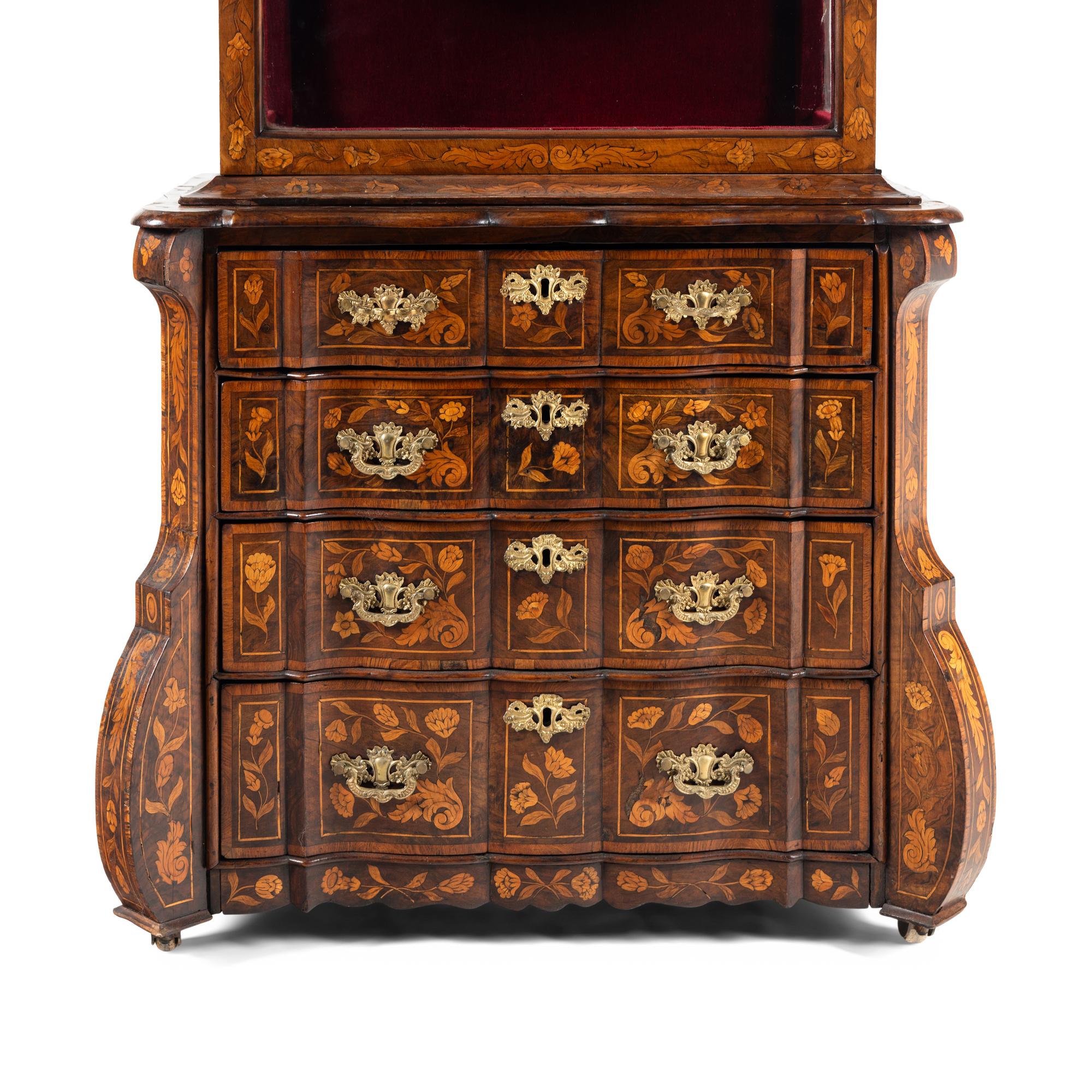 A Dutch Marquetry Bookcase on Chest