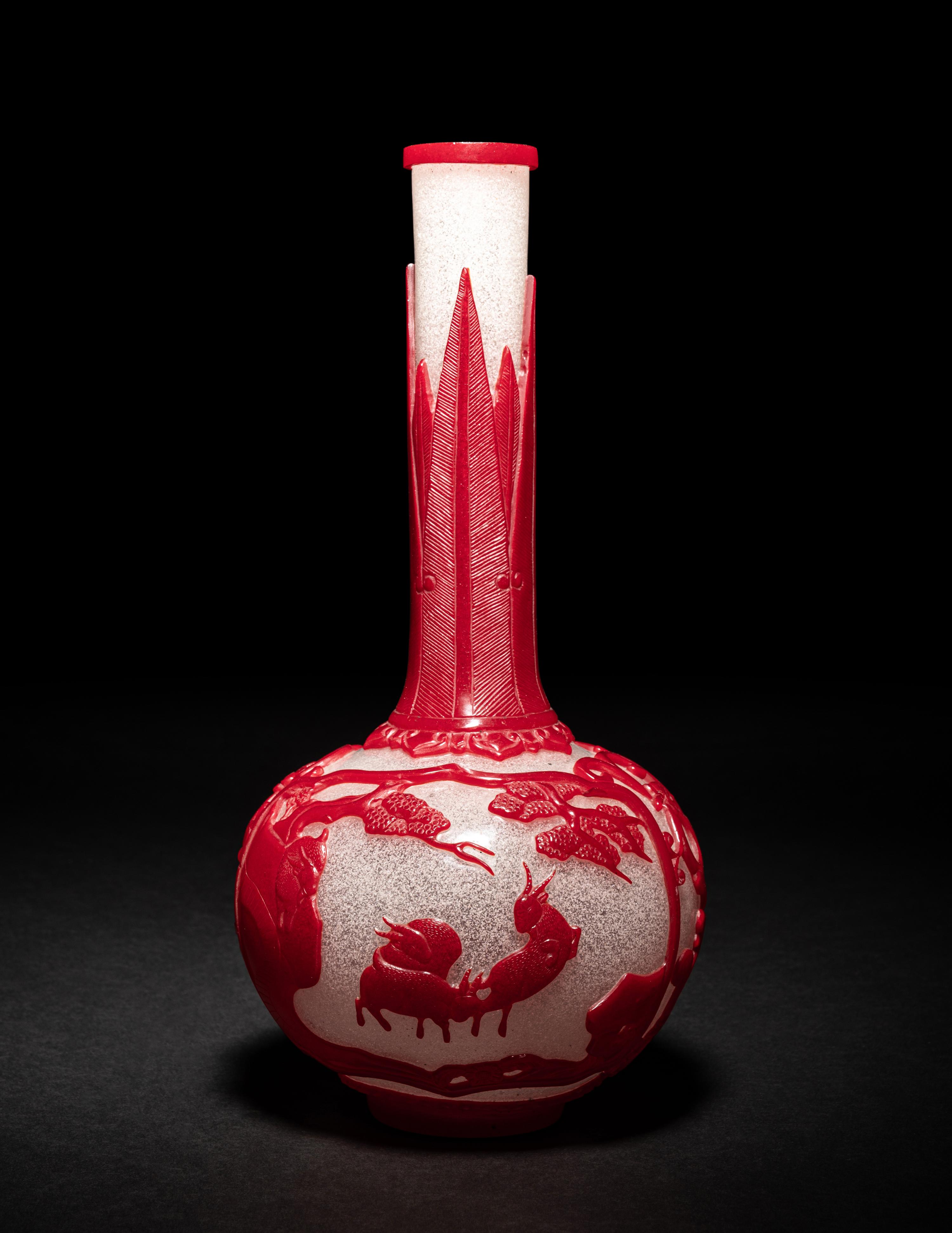 A Chinese Red Overlay Snowflake Ground Peking Glass Bottle Vase