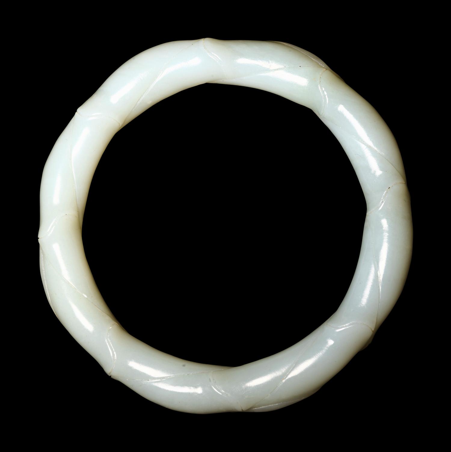 A Pale Celadon Jade 'Bamboo' Bangle