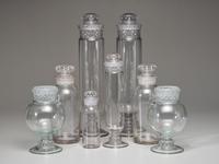 Eight Molded Glass Display Jars