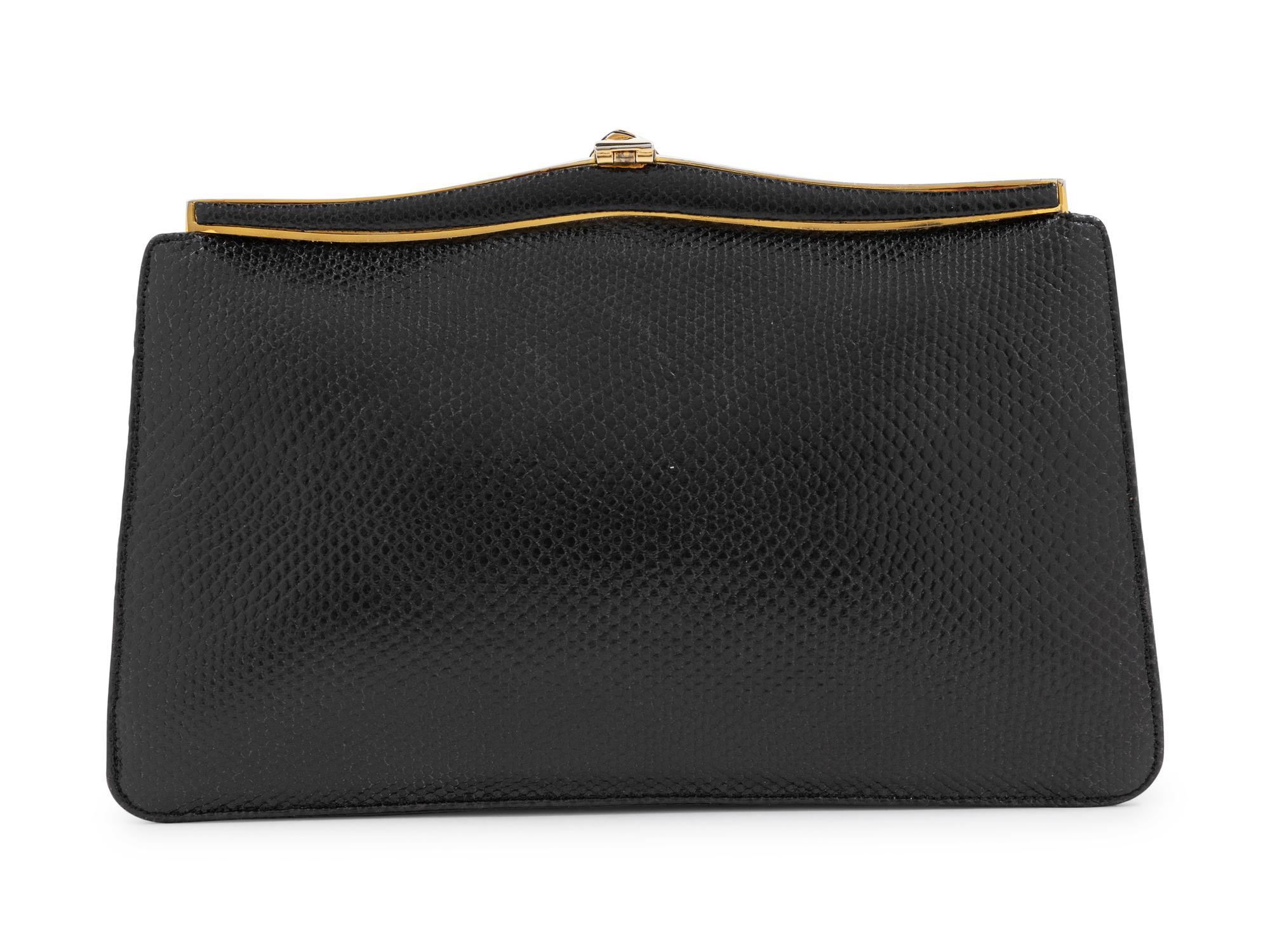 A Judith Leiber Black Leather Clutch