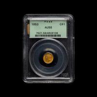 An 1853 Liberty Head $1 Gold Coin (PCGS AU58)