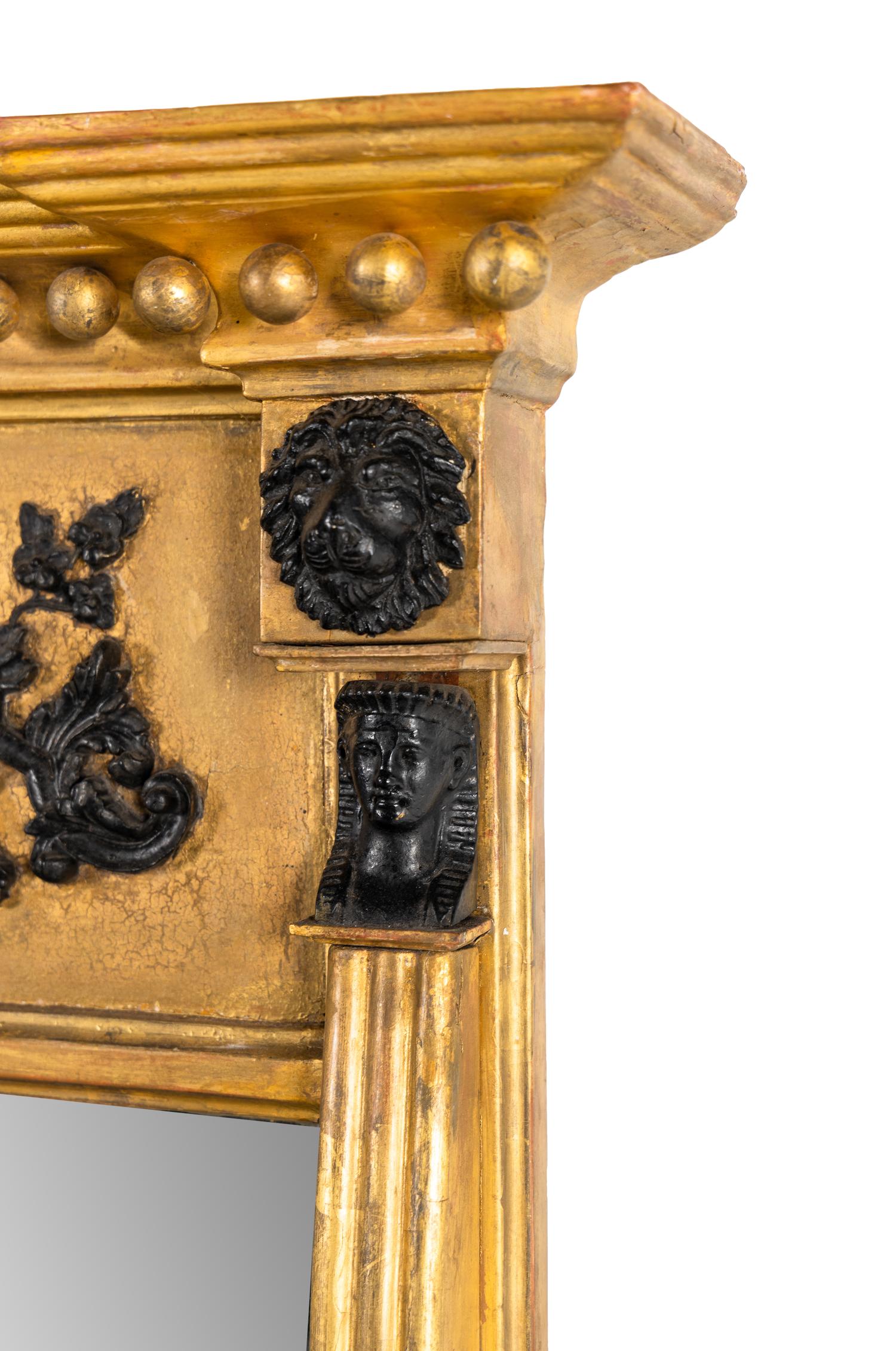 A Classical Gilt and Part Ebonized Overmantel Looking Glass