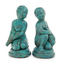 A Pair of Patinated Cast Metal Figures
