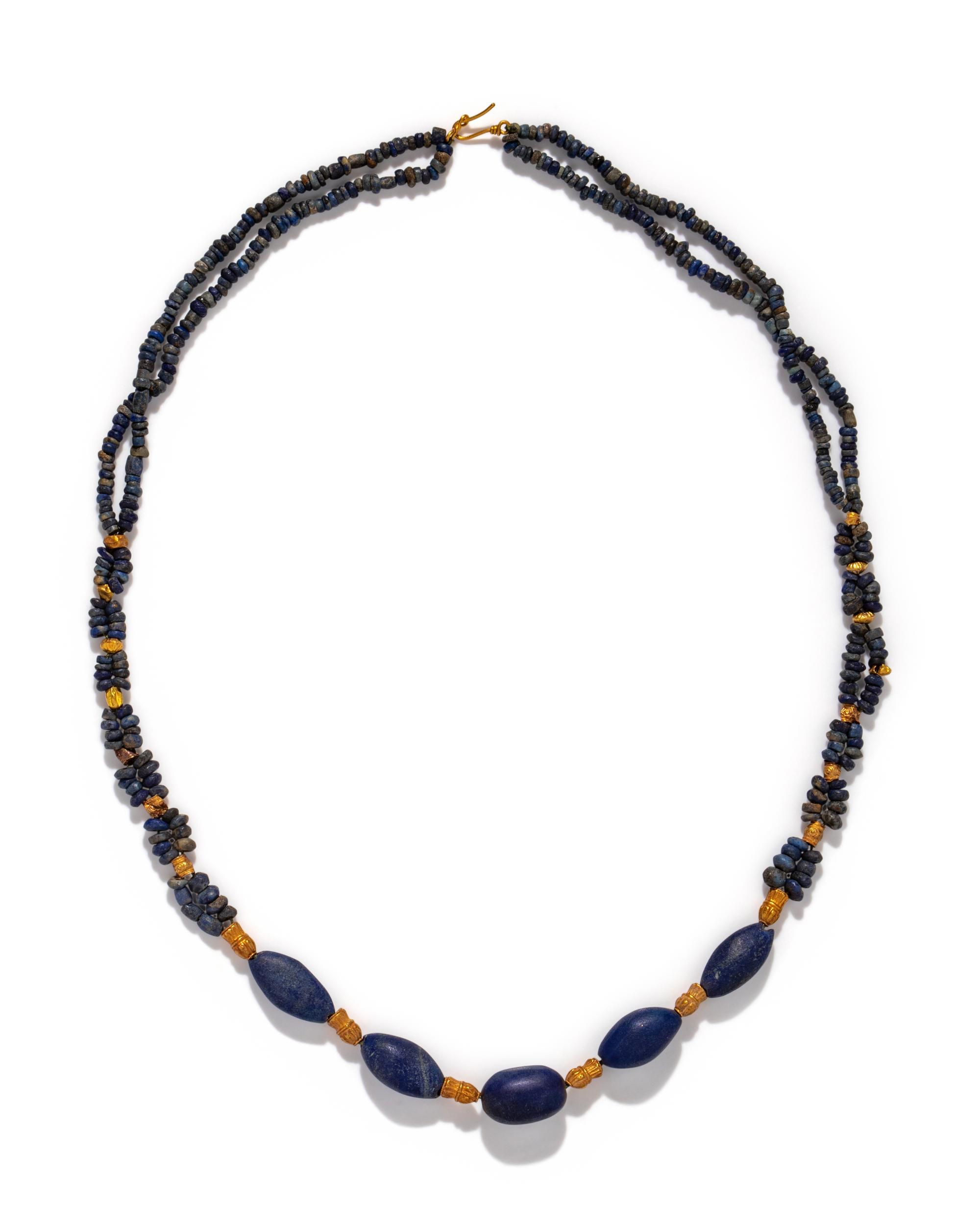 A Western Asiatic Lapis Lazuli and Gold Bead Necklace