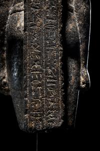 An Egyptian Granite Torso of an Official