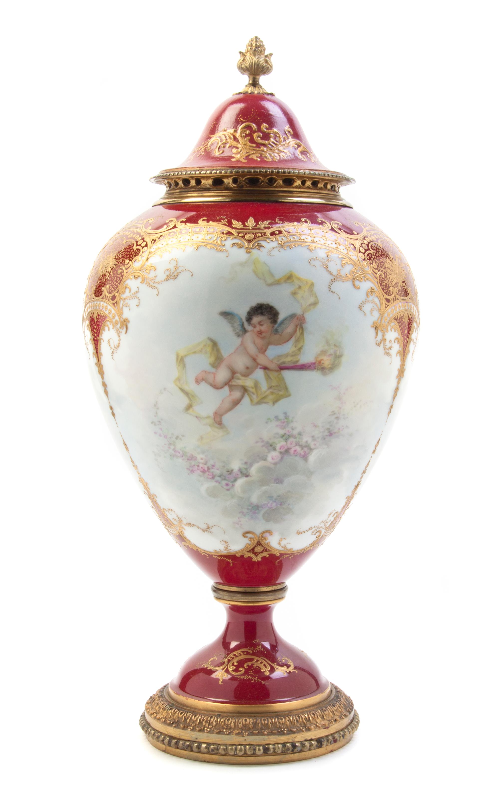 A Sevres Style Porcelain and Gilt Metal Mounted Urn, Height 23 inches.