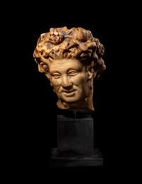 A Roman Marble Head of a Satyr