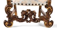 A Pair of Italian Baroque Style Parcel Gilt Walnut Armchairs